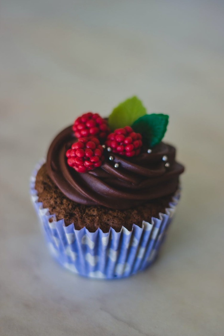Chocolate Cupcake with Icing and Raspberries - Cupcake Recipe